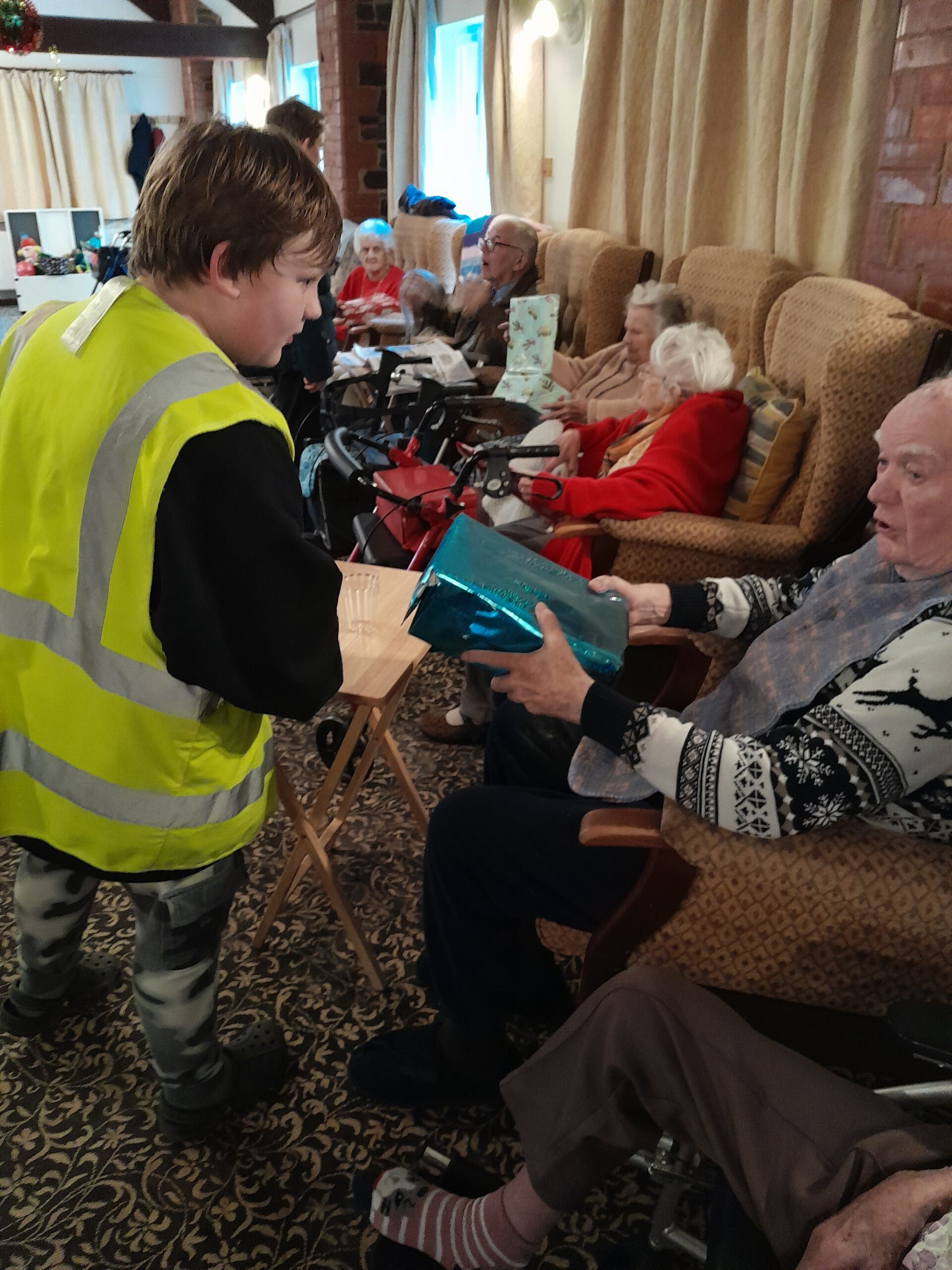 Learners from Highgate Hill House School walk to local care home to deliver gifts including handmade cards, decorations and heartfelt poems.